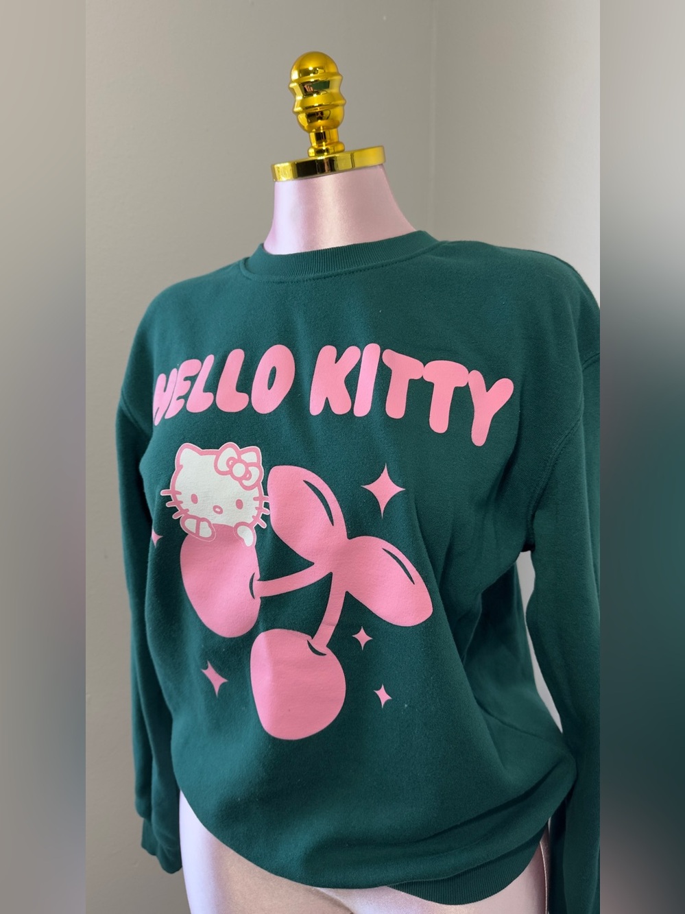 Hello Kitty Dark Green Crewneck with Pink Cherry Graphic